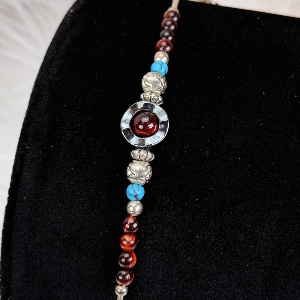 Silvertone and blue liquid silver southwestern style bracelet